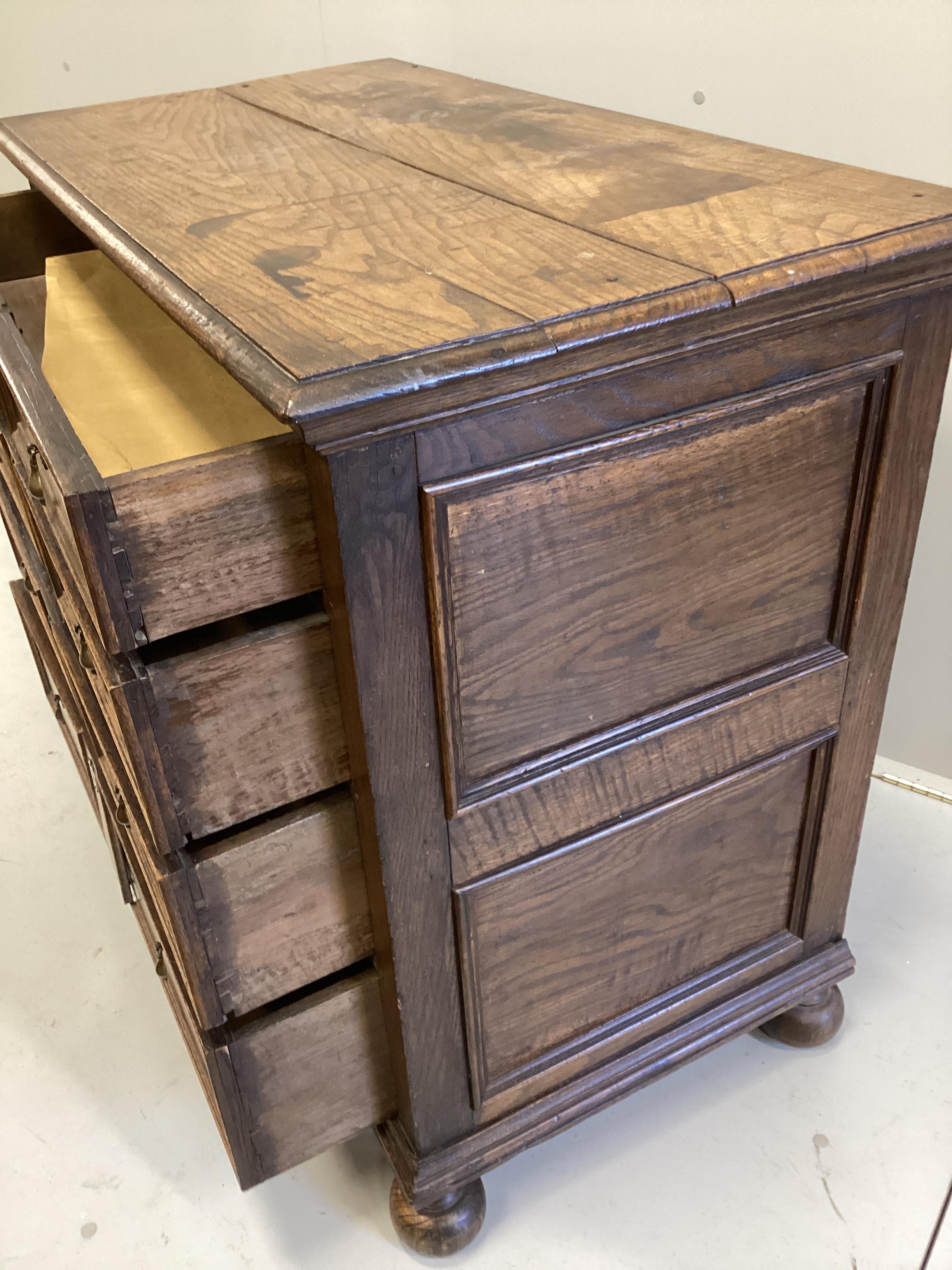 An 18th century oak four drawer chest, width 107cm, depth 56cm, height 90cm